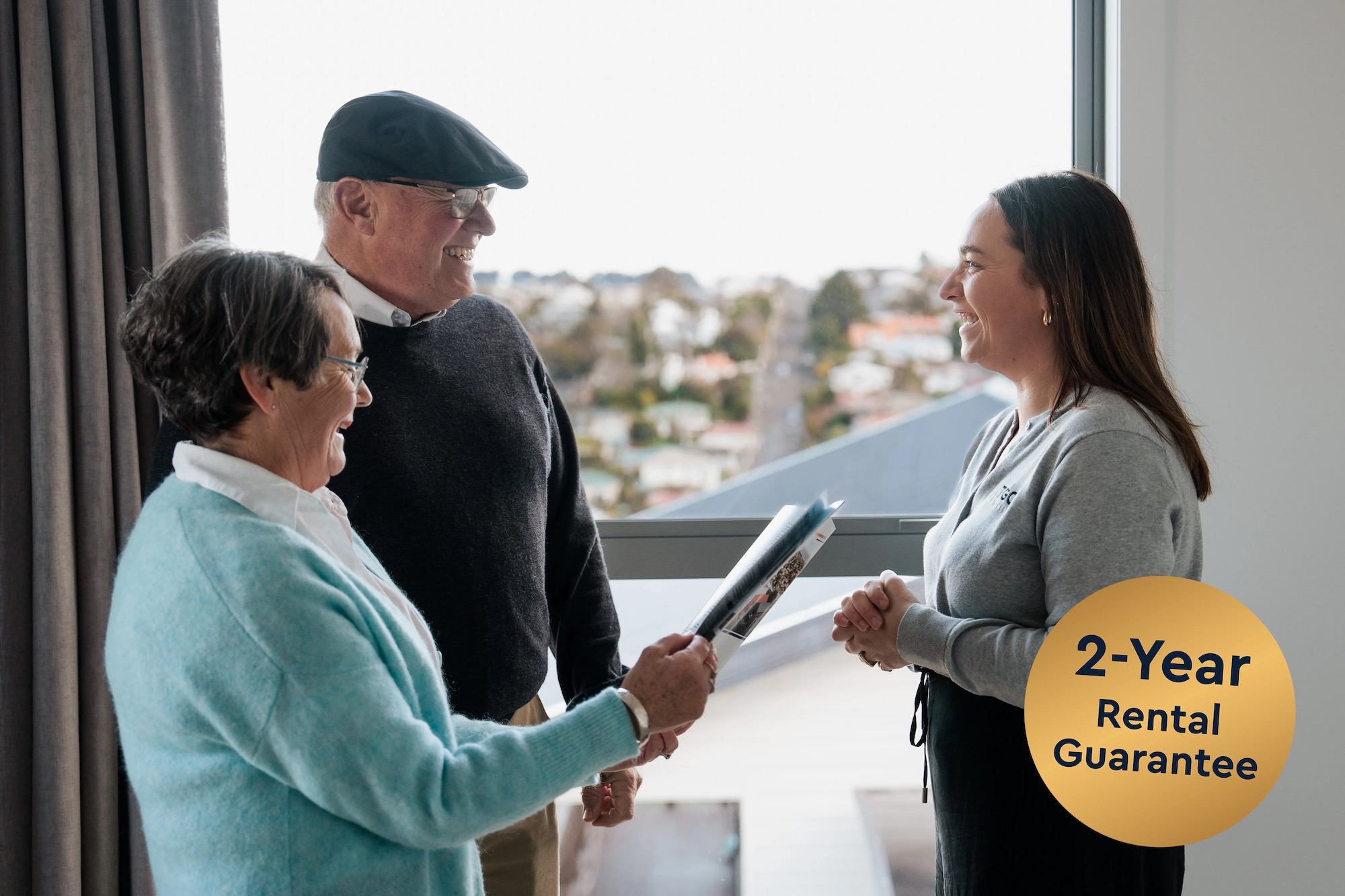 TGC Homes office manager Amy Berthelsen with clients