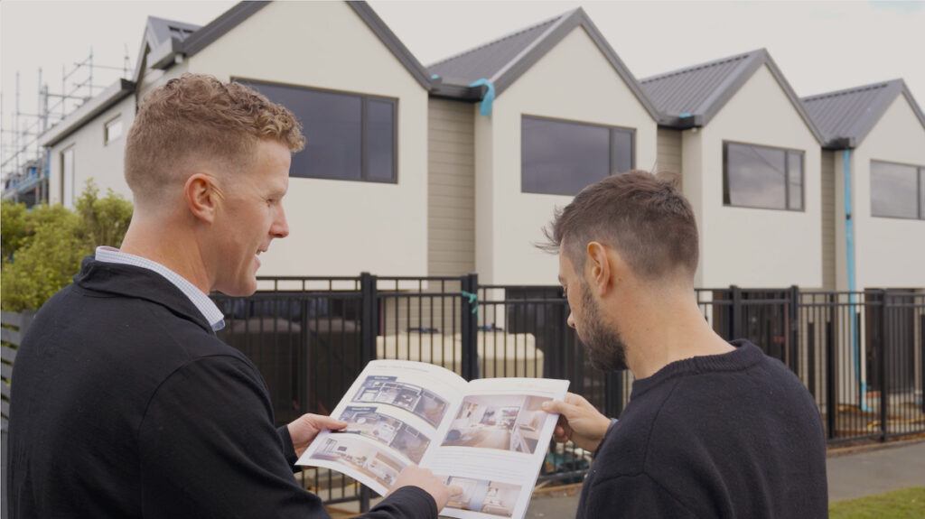 Charles and client talking about the Property Information Manual