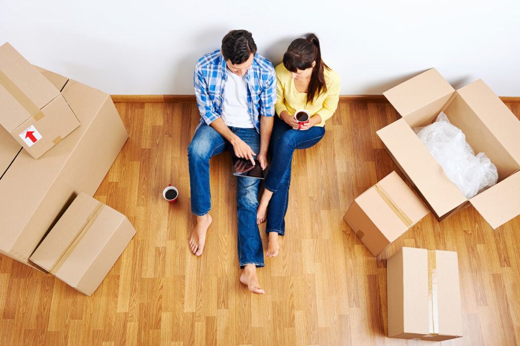 Couple moving in to their new home